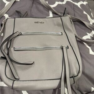 Nine West Gray Crossbody Bag with Tassels and Modern Design